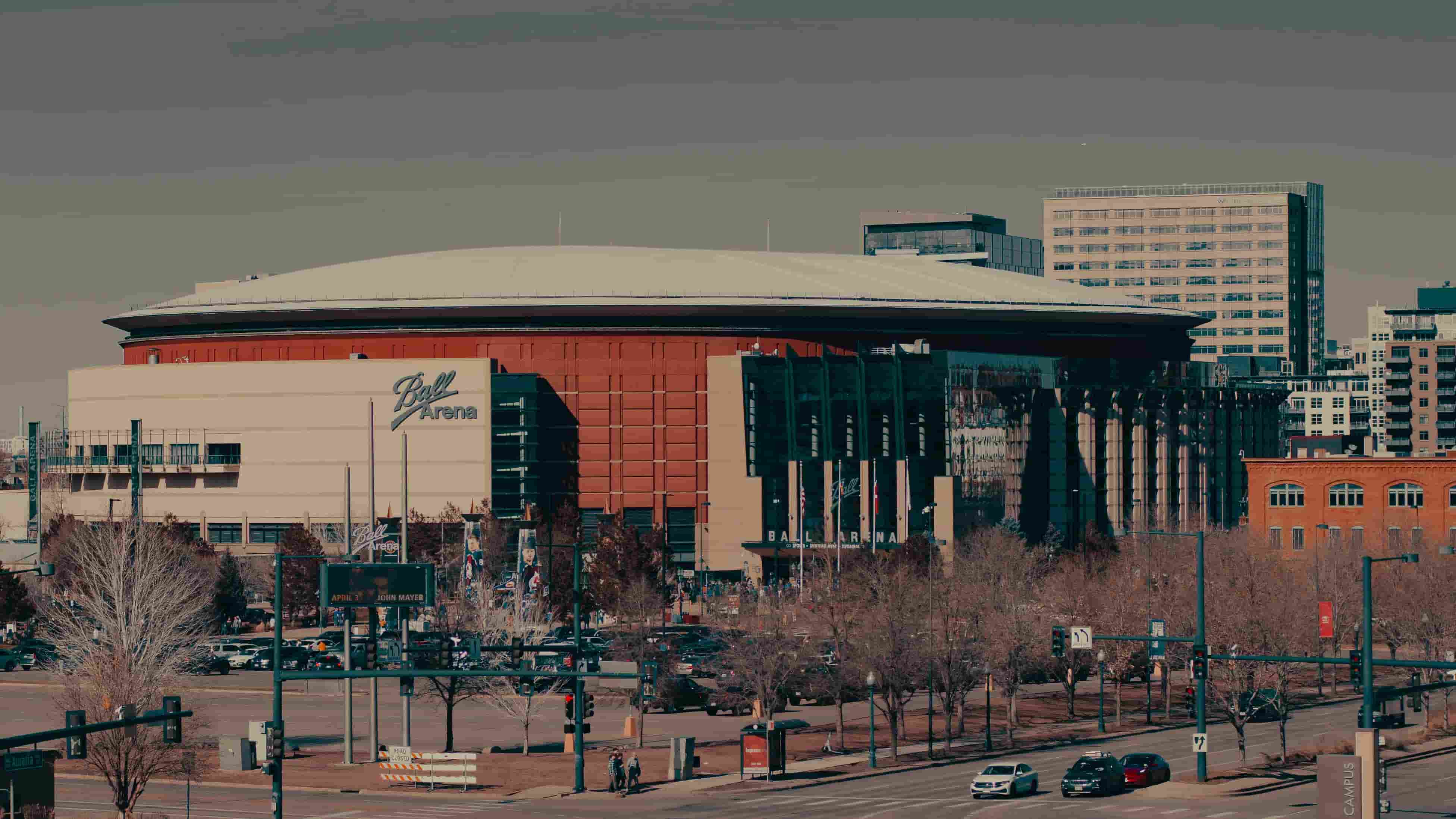 Denver, Colorado skyline with the Rocky Mountains, home to ADT-powered security by NetSecure360